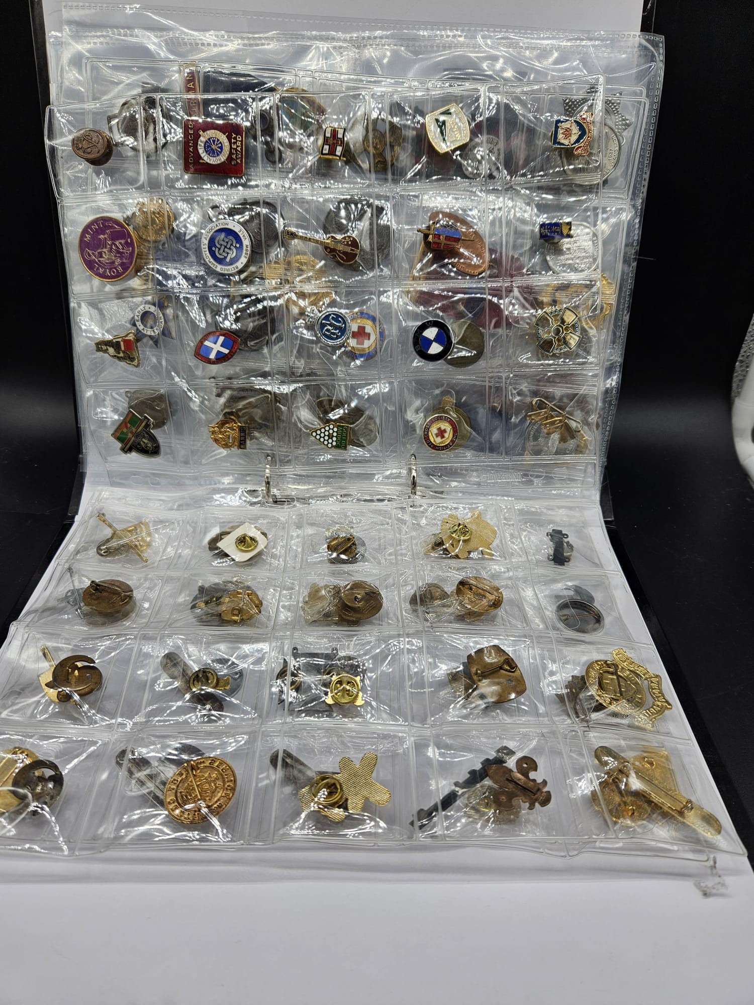 A quantity of Pin badges, medallions and other vintage items