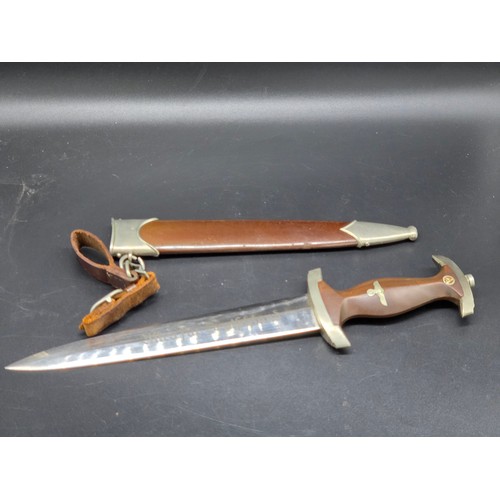 926 - An S. A. Third Reich German dress dagger by Gustav Spitzer - Solingen. This dagger and sheath are in...