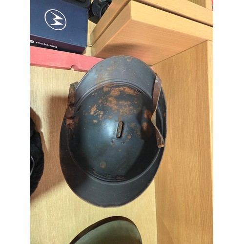 737 - Three military helmets together with a Russian Ushanka Soviet hat