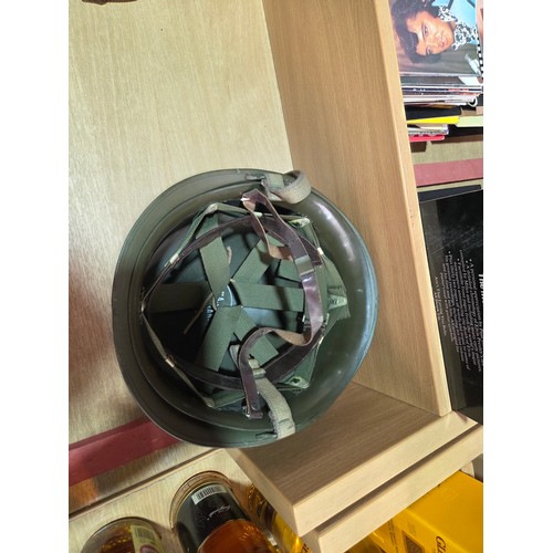 737 - Three military helmets together with a Russian Ushanka Soviet hat