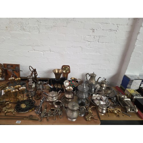 512 - Metalware including brass sconces, silver plated teapots, copper statue etc