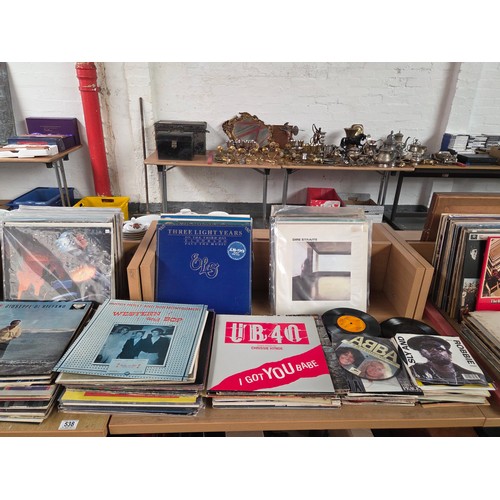 538 - A collection of mix genre vinyl records to include ZZ Top, Black Sabbath, Dire Straits etc