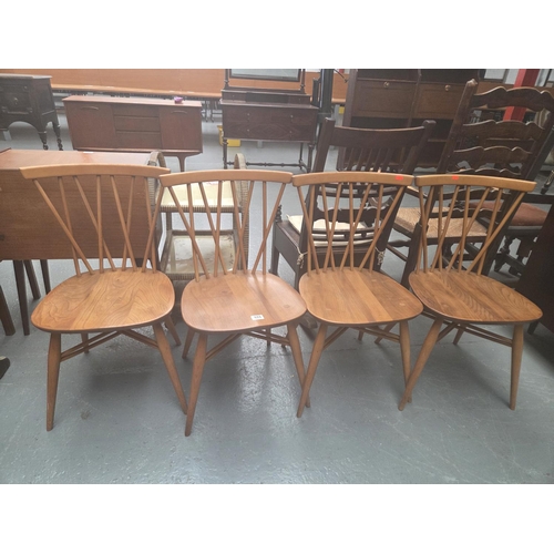 633 - Four Ercol candlestick dining chairs