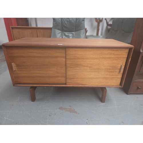 655 - A mid century teak sideboard with sliding doors believed to be by Herbert Berry for Lucas
H66cm  W11...