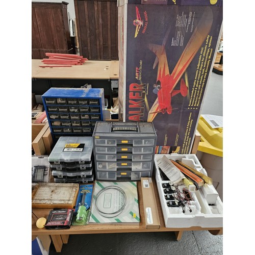 528 - A boxed Spacewalker model plane, petrol powered helicopter (untested) together with other remote con... 