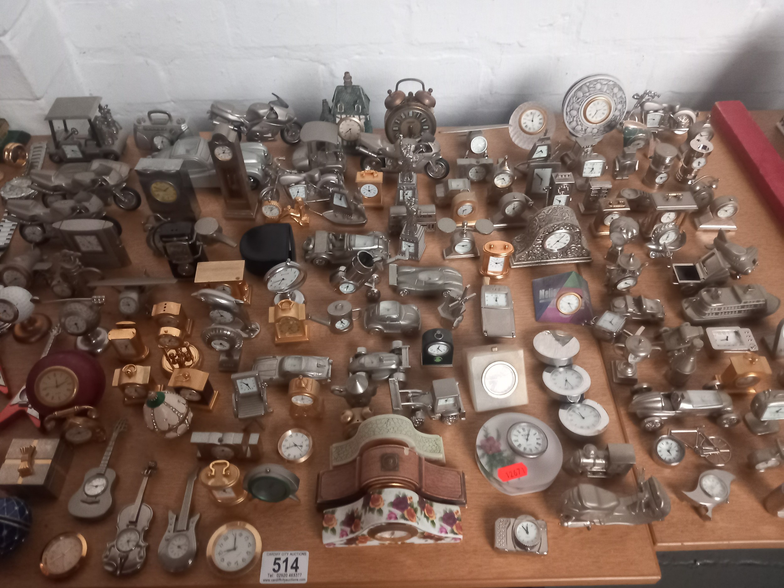 A large quantity of miniature novelty clocks and watches and pocket watches
