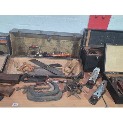 507 - Six various carpenter's tool boxes with an assortment of Stanley and Record planes, clamps, saws etc