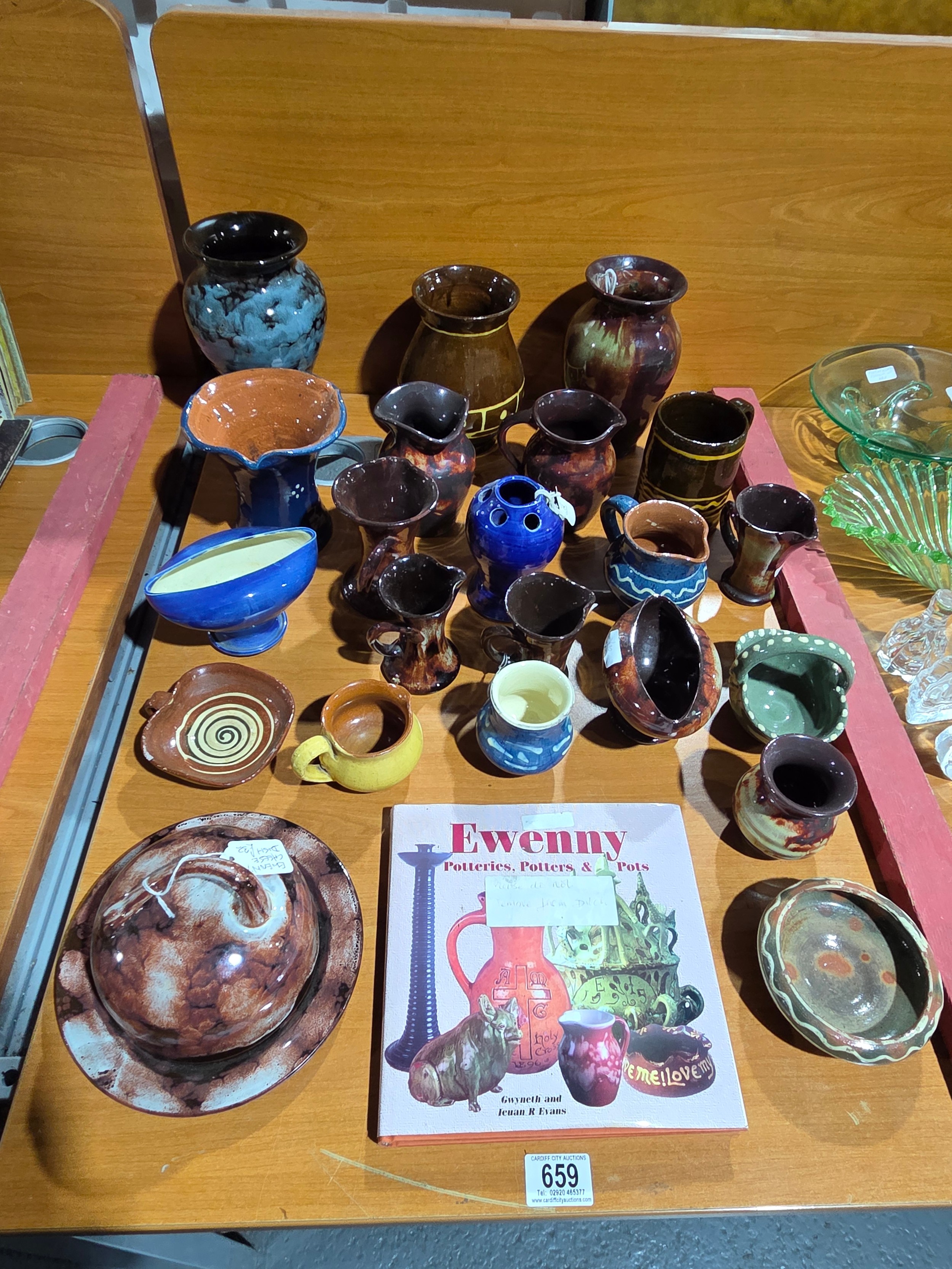 A collection of Ewenny pottery with reference books