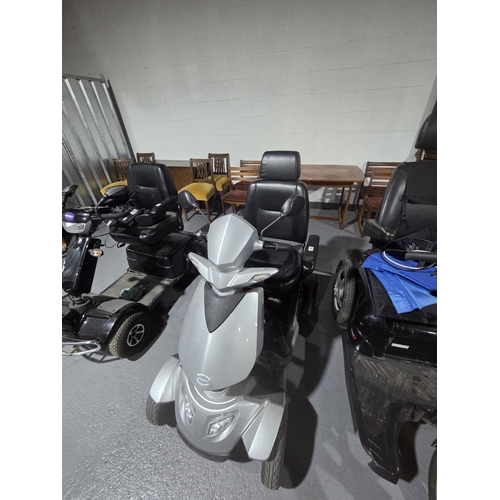 An electric Rascal Ventura mobility road legal scooter with charger and ...