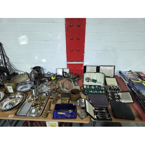 702 - Metalware to include cased cutlery sets, Anglepoise lamps, silver plated serving trays, etc