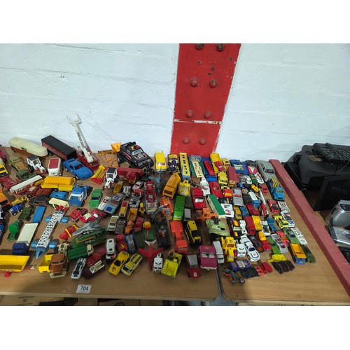 704 - A collection of playworn diecast model cars to include Corgi, Matchbox, Tonka, etc
