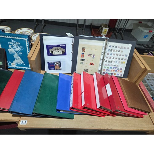 719 - A large world stamp collection in albums