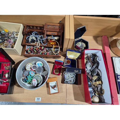 721 - A quantity of costume jewellery, watches and pin badges