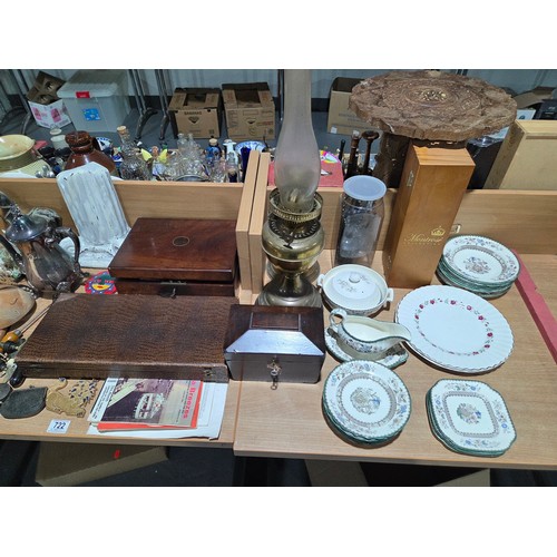 722 - Two brass oil lamps, writing slope, tea caddy, ornaments, lamps, etc