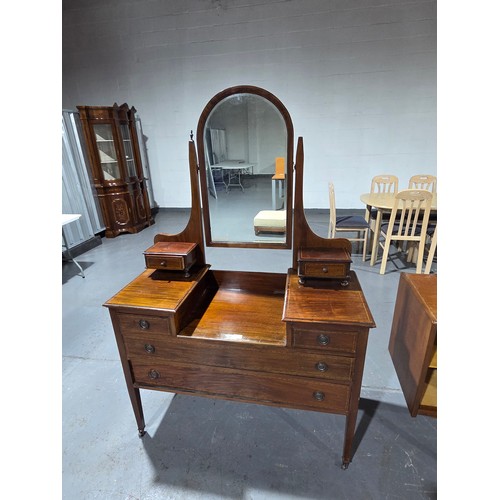 814 - A mahogany inlaid single mirror dressing chest

Height 168cm, width 102cm, depth 48cm