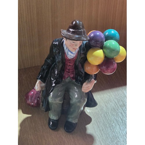 517 - Eight large Royal Doulton figurines - The Old Balloon Seller, The Balloon Seller, Biddy Pennyfarthin... 