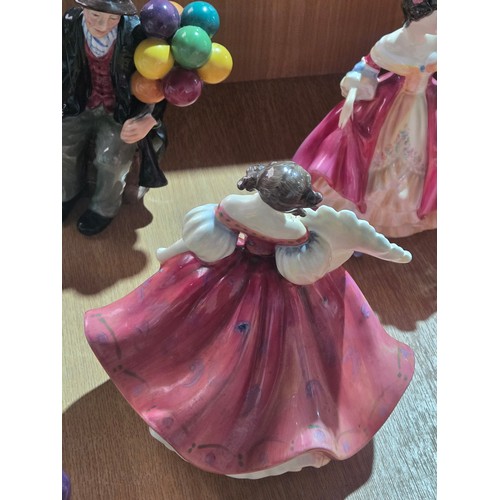 517 - Eight large Royal Doulton figurines - The Old Balloon Seller, The Balloon Seller, Biddy Pennyfarthin... 