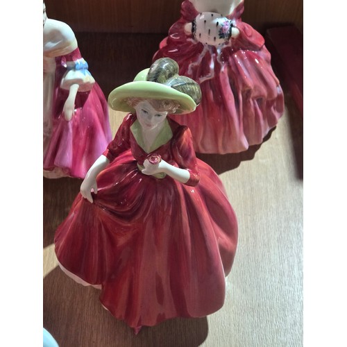 517 - Eight large Royal Doulton figurines - The Old Balloon Seller, The Balloon Seller, Biddy Pennyfarthin... 