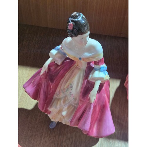 517 - Eight large Royal Doulton figurines - The Old Balloon Seller, The Balloon Seller, Biddy Pennyfarthin... 