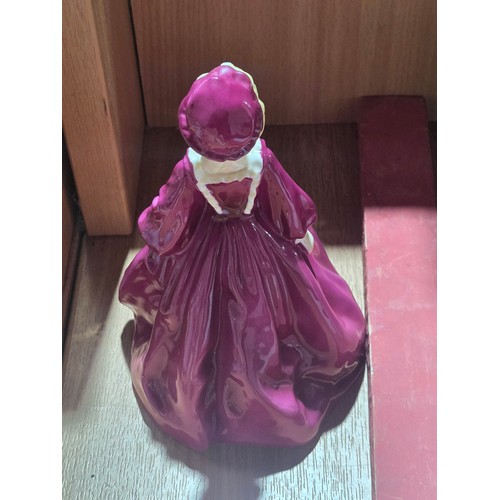 519 - A collection of Royal Doulton, Royal Worcester and Coalport figurines of varying sizes