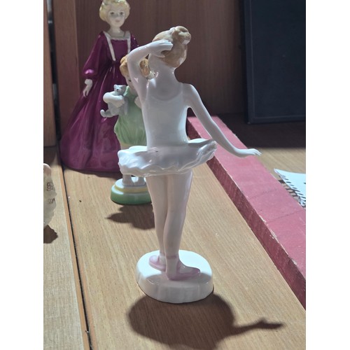 519 - A collection of Royal Doulton, Royal Worcester and Coalport figurines of varying sizes