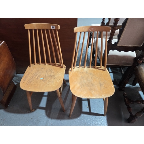 443 - Two Ercol spindle back dining chairs
