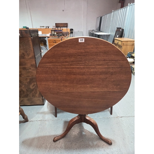 448 - A mahogany tilt top table on tripod base