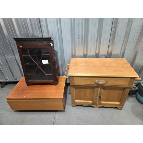 449 - A mahogany wall mounted corner cabinet, teak cabinet, and a pine bathroom cabinet with towel rail