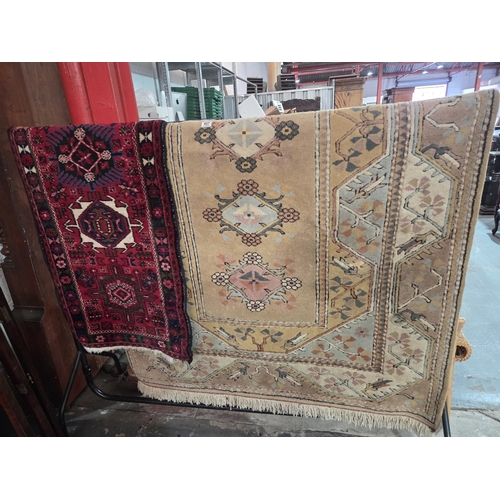 457 - Two hand woven carpets/ rugs
