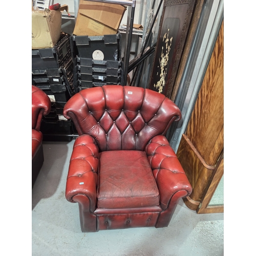 464 - A red leather Chesterfield armchair