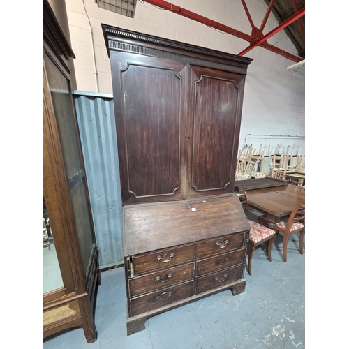 467 - A mahogany bureau bookcase on bracket feet measurements: Height 224cm, width 106cm, depth 60cm