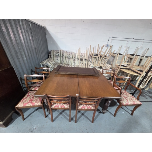 468 - A mahogany wind out dining table with two extra leaves, hand crank and six chairs