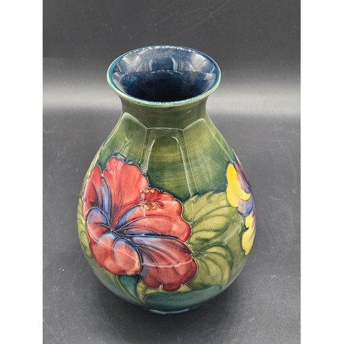 503 - A large Moorcroft vase in the hibiscus pattern - impressed Moorcroft mark and blue signature - 21cm ... 
