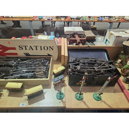 628 - A selection of Hornby O gauge wagons, track and accessories, Triang trucks and a wooden 