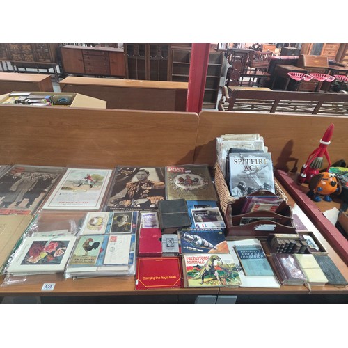 658 - A selection of mixed vintage ephemera, postcards, newspapers, cigarette/tea cards etc