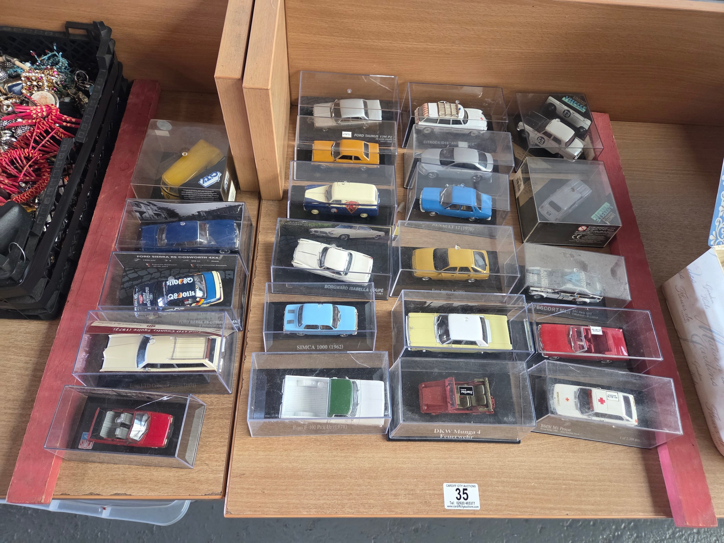 Twenty one boxed die cast model cars
