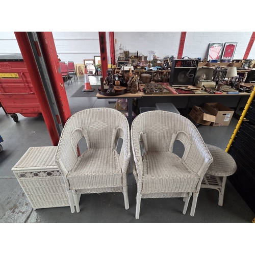 500 - Four Lloyd loom style wicker chairs with laundry basket and side table