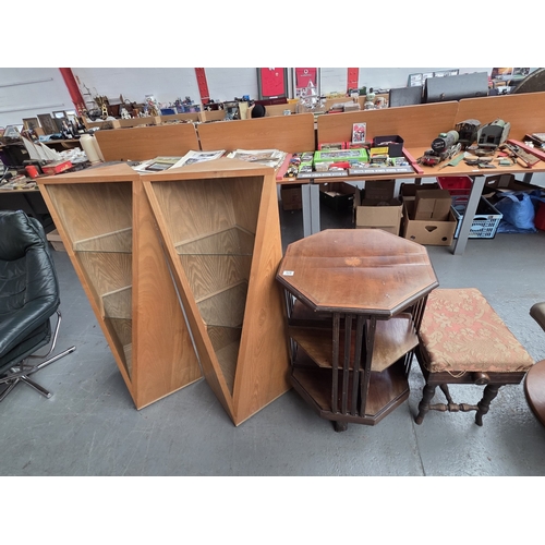 505 - Two corner cabinets, footstool and an octagonal revolving bookcase