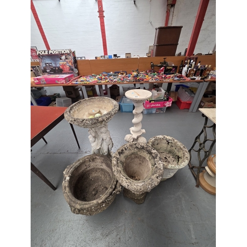 508 - Three stone effect planters, birdbath and one other statue