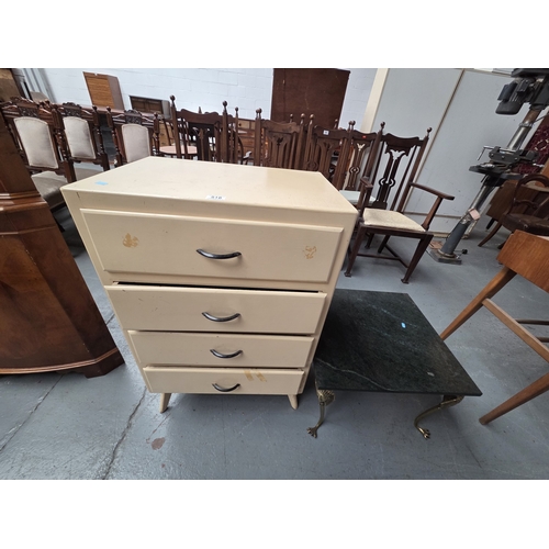 516 - A four drawer chest of drawers with a marble effect top coffee table