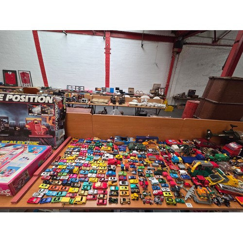 470 - A large collection of unboxed diecast cars and vehicles