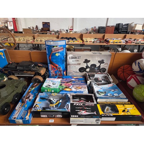 473 - Boxed games and toys to include Hot Wheels and some unboxed toys