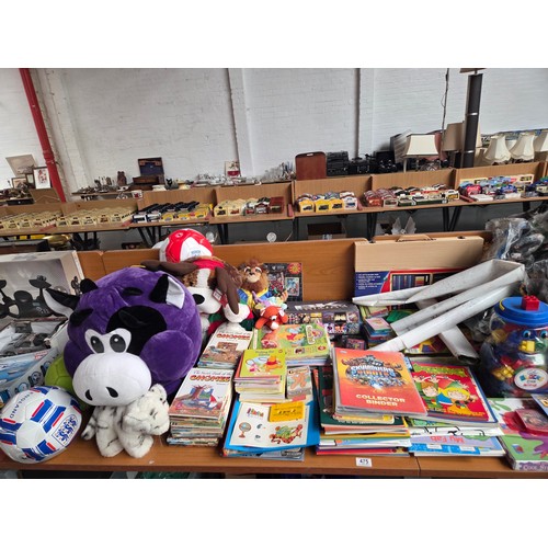 475 - A large quantity of toys, games and books to include bagged McDonald's toys