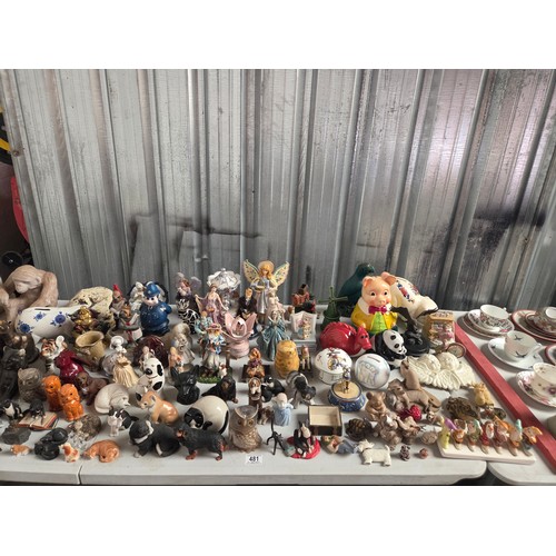 481 - A large collection of figurines, many being animals