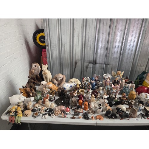 481 - A large collection of figurines, many being animals