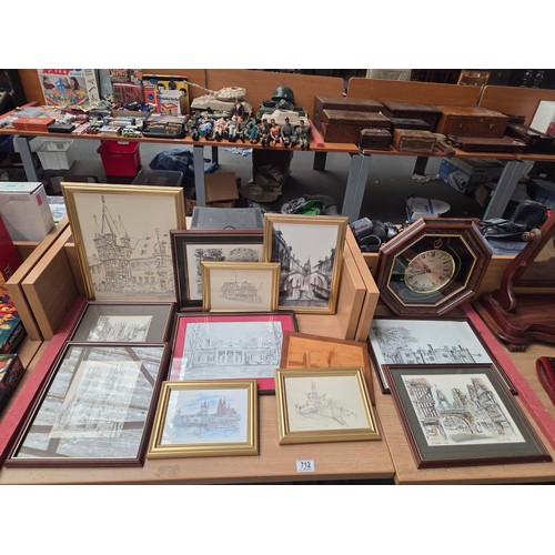 712 - A collection of framed pictures and prints - historical buildings and a Quartz wall clock