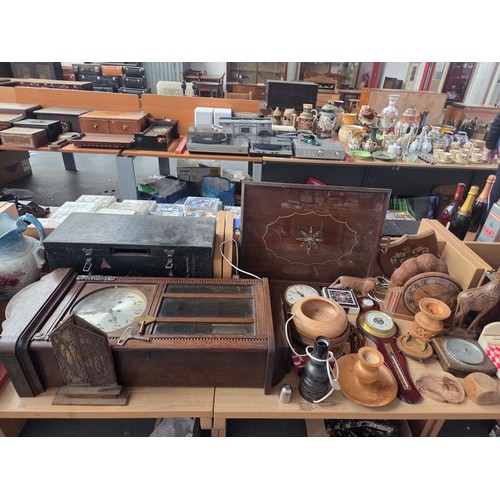 714 - A wall mounted clock, military box, smoker's cabinet, lamps and other wooden items