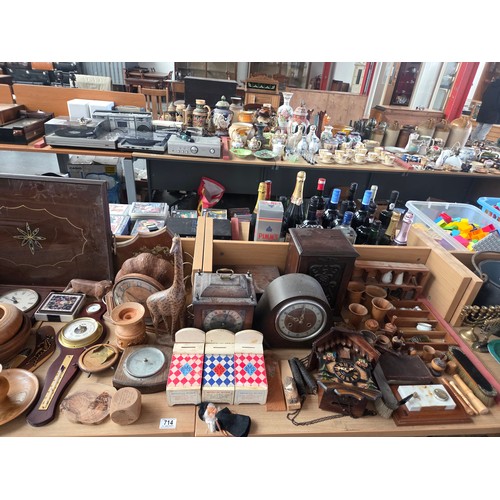 714 - A wall mounted clock, military box, smoker's cabinet, lamps and other wooden items