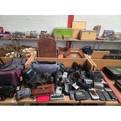 720 - Sony, Minolta, Fujifilm cameras with mobile phones, binoculars etc.