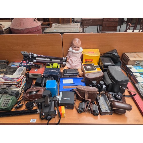 727 - A Remington typewriter, Kodak, Vivitar and other cameras and lenses, Tonka trucks, and other vintage... 